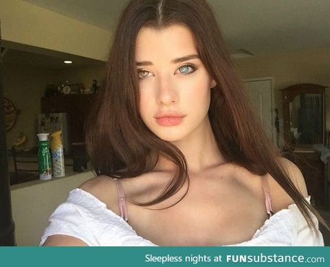 Female human with heterochromia iridum (or different colored eyes)