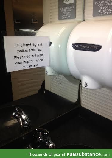 This Sign in the Bathroom of a Movie Theater Creates a Few Questions