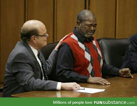 Picture of a man being told he was innocent, after 40 years spent in prison