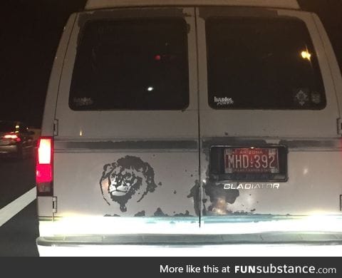 The bad paint on the van is scratched off to look like a lion