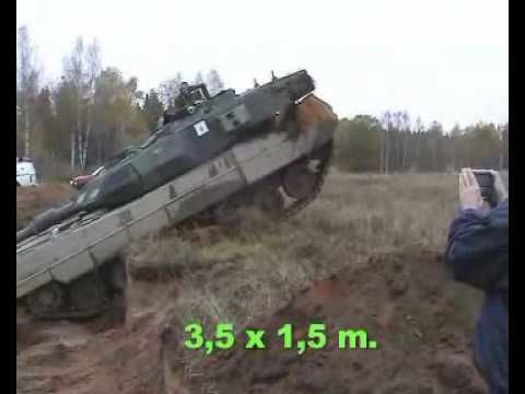 How a tank crosses trenches at low and high speeds