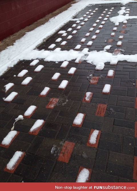 The snow on the red bricks didn't melt