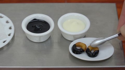 Cooking donuts in a miniature kitchen