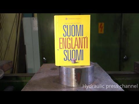 Hydraulic press attempts to crush a book, and the book kind of won