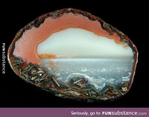 A scene of the ocean inside a Agate stone