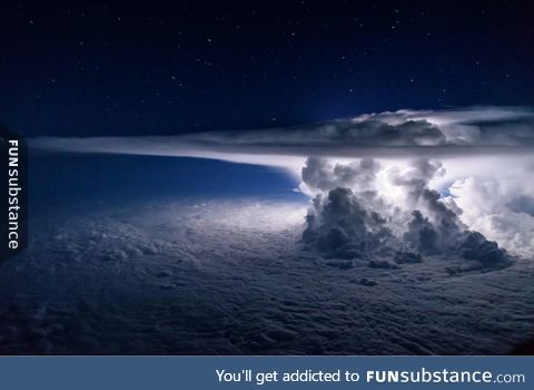 This picture of a thunderstorm at night over the Pacific ocean was taken at 37,000 feet