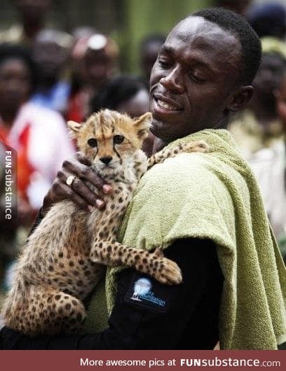 Usain Bolt celebrating his olympic victory with his son