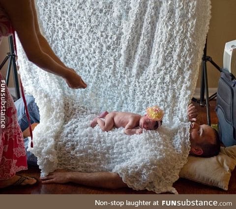 Well, That's One Way To Keep A Baby Calm For Photos