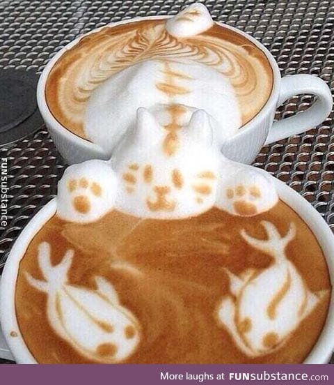 Latte art in two mugs