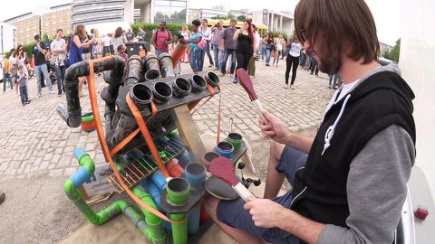 Awesome pipe-drummer plays electronic music unplugged