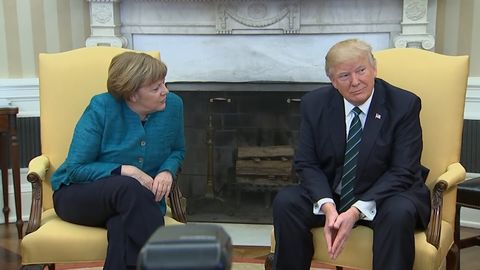 Donald Trump refuses to shake hands with Angela Merkel