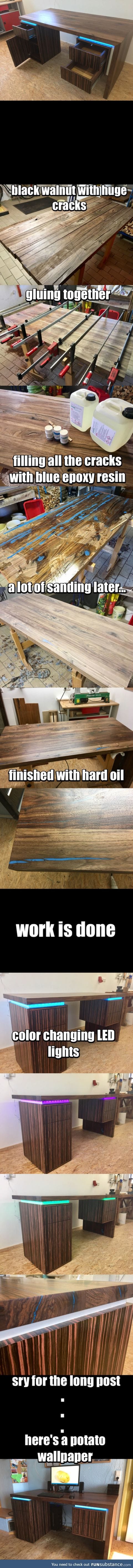 A desk made out of black walnut with blue epoxy inlay