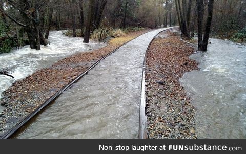 Train rails make rain trails