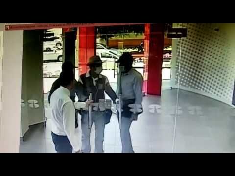 3 guys try to rob a bank, employee locks the door right in their face