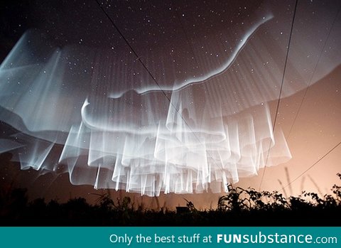 The Aurora Borealis in rare white