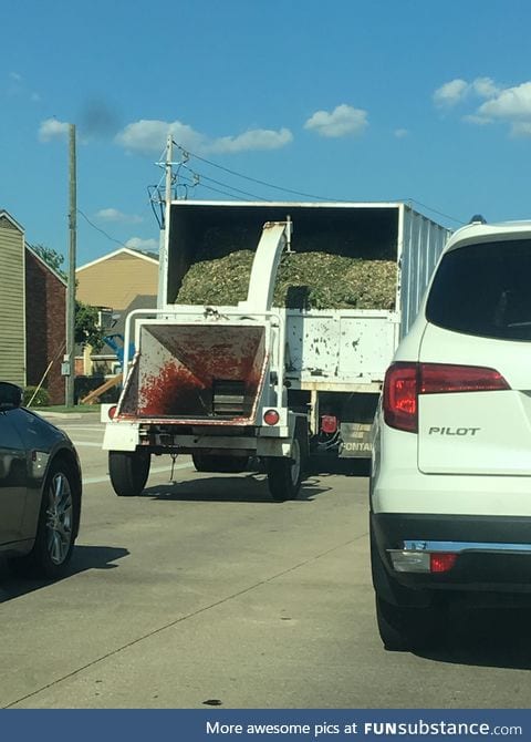What the....? Who uses red paint for a base color for a wood chipper?