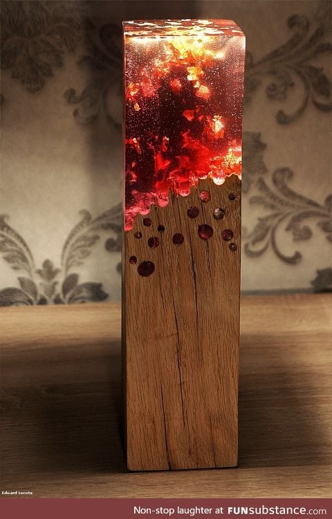 Wood lamp made with acrylic glass looks like it's burning