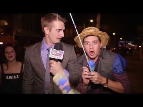 Guys dressed as news reporters for Halloween and interviewed people