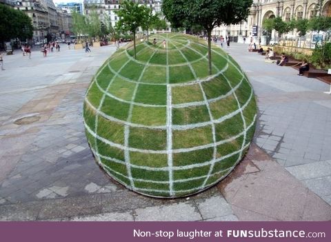 Grass Ball Illusion outside Paris City Hall