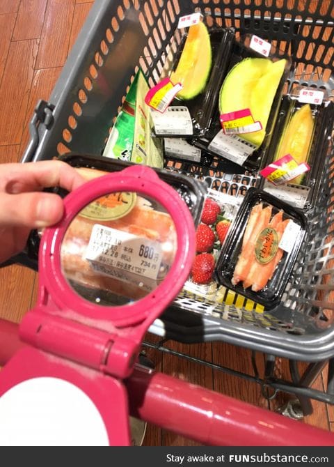 Japanese shopping karts have magnifying glasses for the elderly!