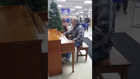 Man walks into Goodwill store and starts playing the piano