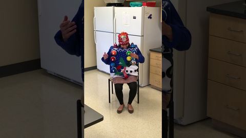 The winner of our Ugly Sweater contest at work plays “Carol of the Bells” on her sweater