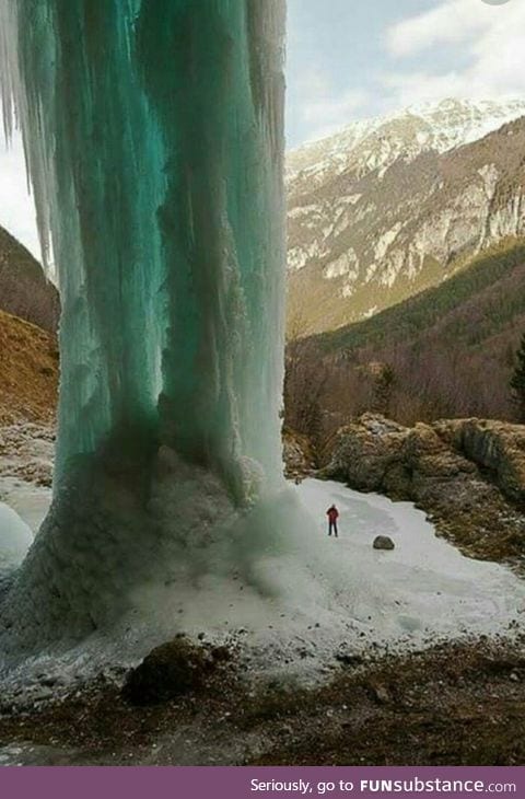 Frozen waterfall in the alps