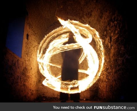 A man and his fire staff