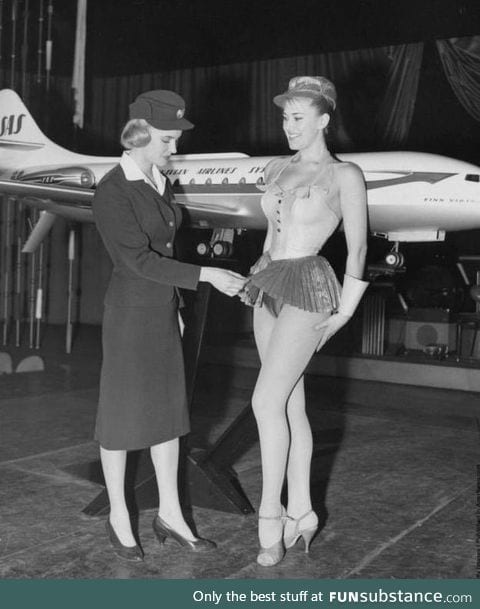 Scandinavian Stewardess examines a new uniform proposal for Scandinavian Airlines in 1964