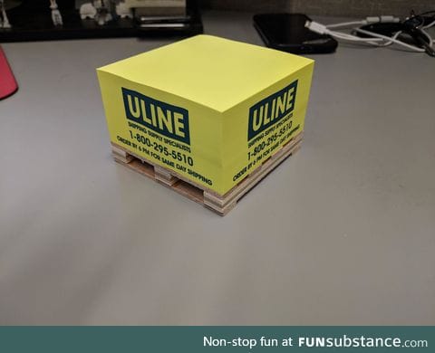 This shipping company advertise their sticky notes with a tiny pallet