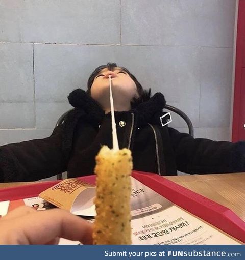 This kid knows how to eat mozzarella sticks