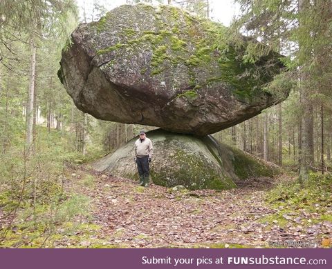 Kummakivi, the largest balancing rock megalith in Ruokolahti, Finland