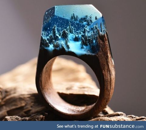 Snowy forest ring made out of wood and resin