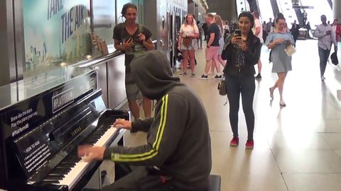 Construction worker kills it on the piano on the way home (watch the whole thing)