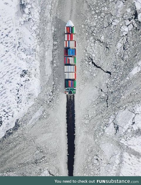 Container ship breaking ice on the Baltic sea