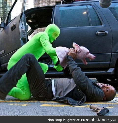 Will Smith being assaulted by a man with a hand puppet