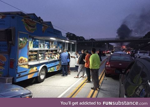Taco truck start doing business during accident related traffic jam