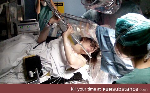 This Russian flutist playing Mozart as surgeons remove her brain tumor