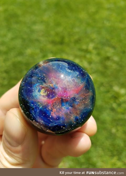 A Galactic Nebula Cosmic Porthole. Glass orb