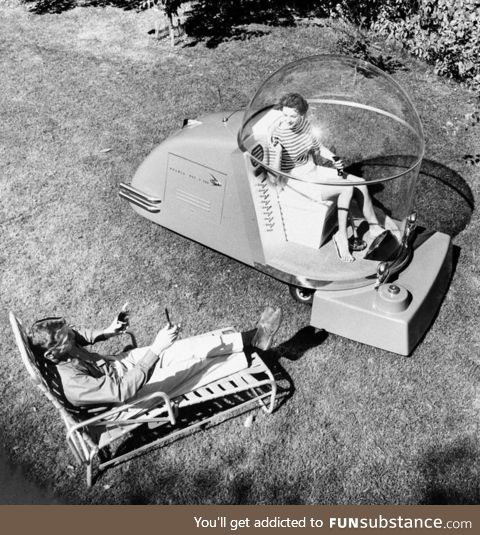 Luxury air conditioned lawn mower of the 1950's