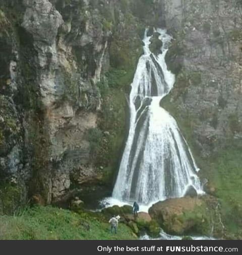 This waterfall looks like a woman in a dress