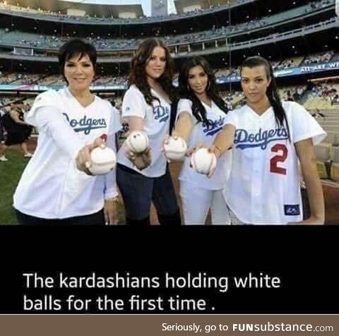 The Kardashians holding white balls