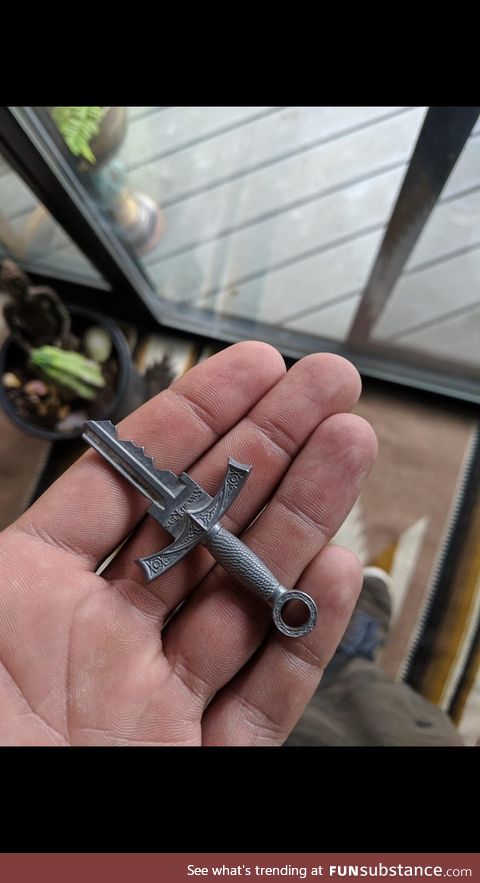 Key shaped like a sword
