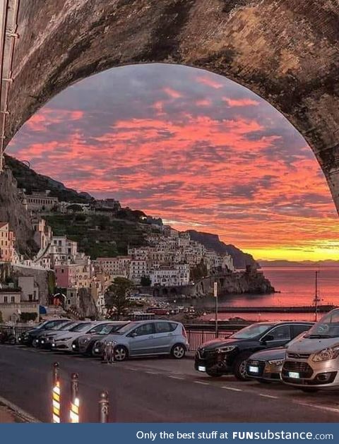 Under the bridge in the sunset, Amalfi, Italy
