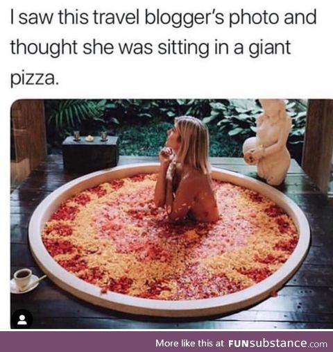Blogger taking a pizza bath