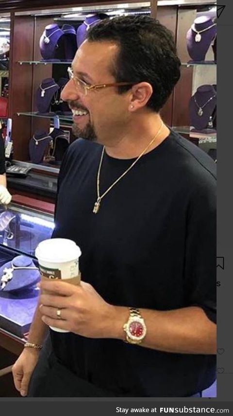 Adam Sandler looks like he owns every gas station in Detroit