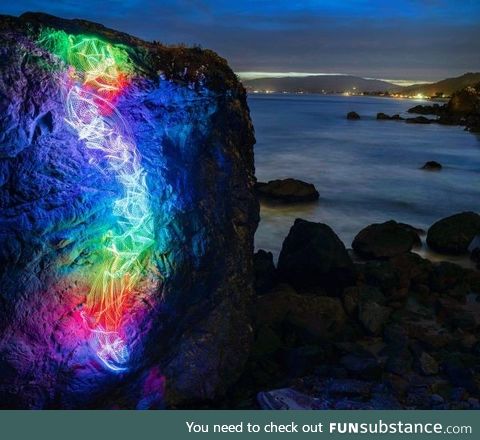 I tied some LEDs to myself and took a long exposure photo of myself rock climbing on the