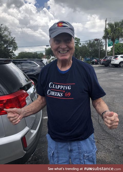 Grandpa wearing his new Goodwill shirt with pride