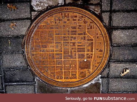 Oklahoma Manhole Covers have a city map on it with a white dot showing where in the city