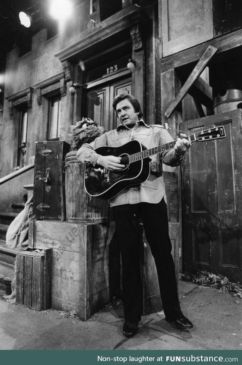 Johnny Cash singing to the first homeless Muppet, circa 1977